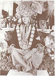 Hans Rawat Dressed as Krishna sitting