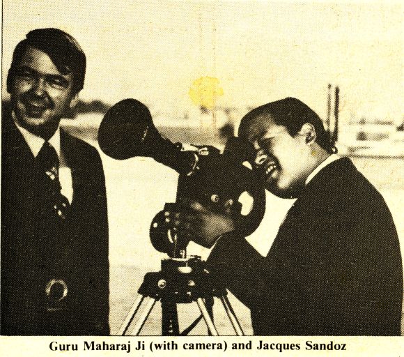 Guru Maharaj Ji (with camera) and Jacques Sandoz