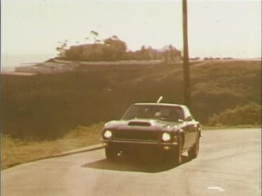 Prem Rawat (Maharaji) Driving His New Aston Martin, 1976