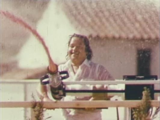Prem Rawat (Maharaji) Showering His Devotees With Coloured Water From Giant Water Pistol