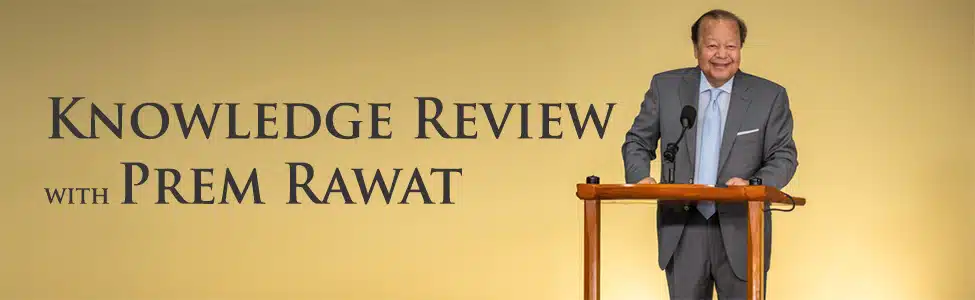 Prem Rawat standing at a podium Prem Rawat standing at a podium